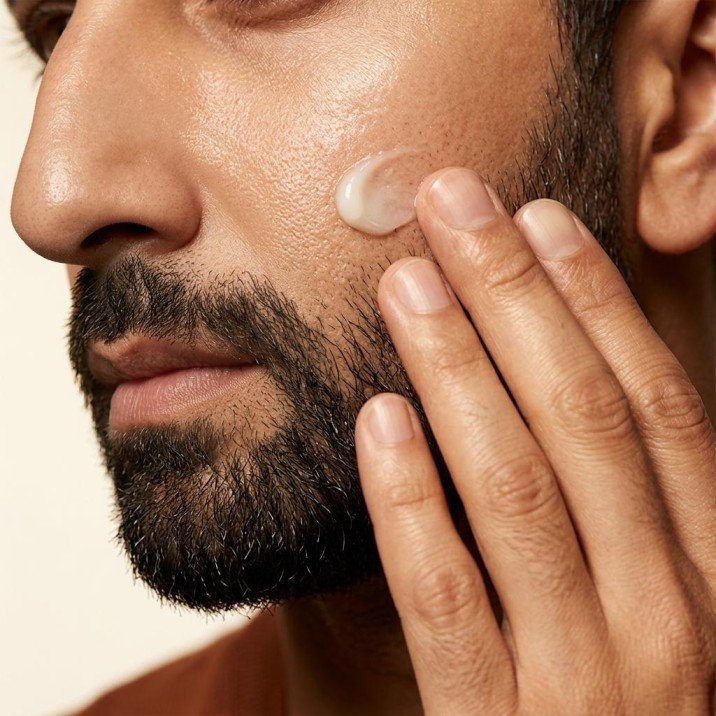 Man applying sunscreen 
